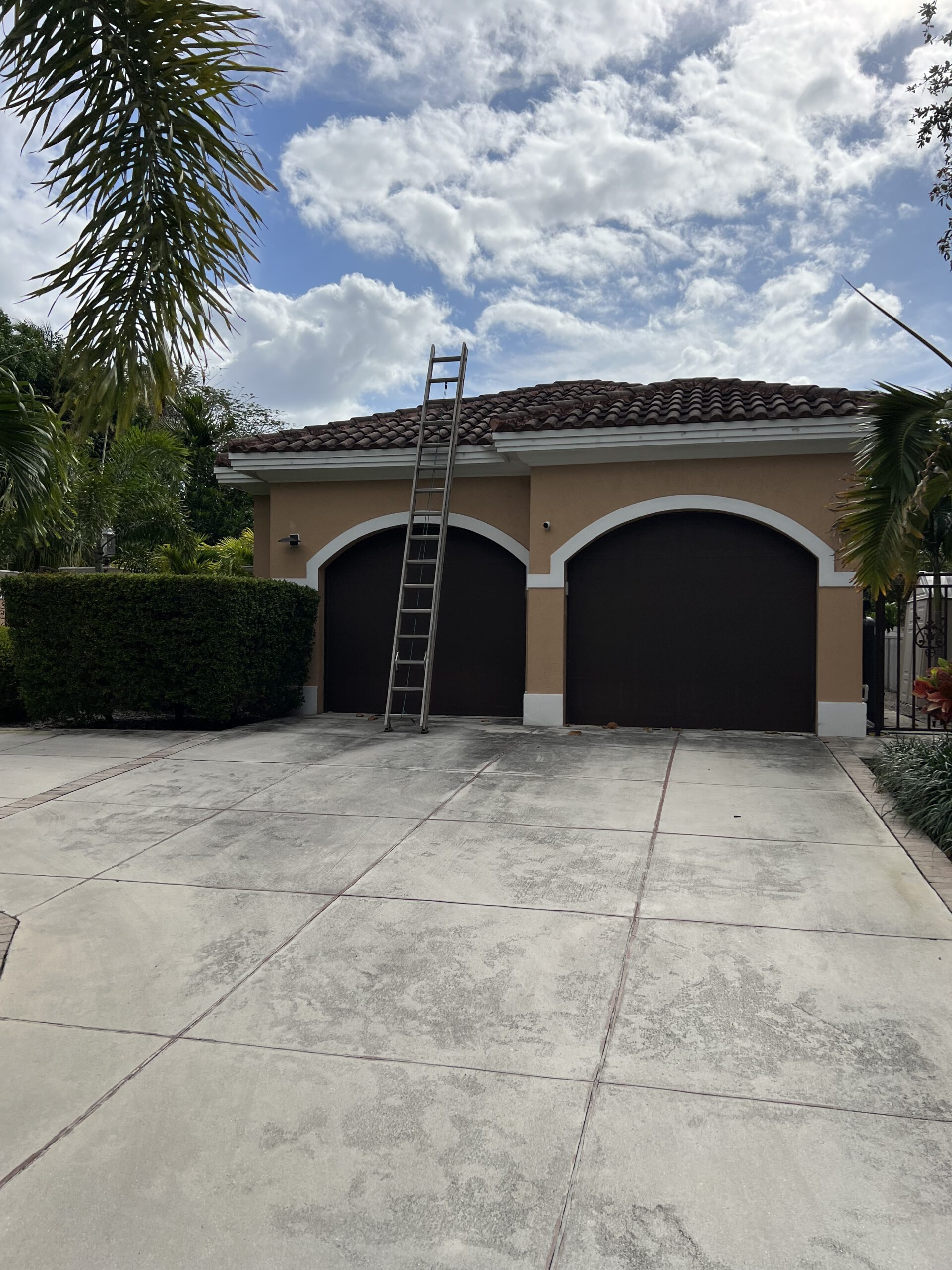 Roof before professional soft washing showing visible staining and buildup